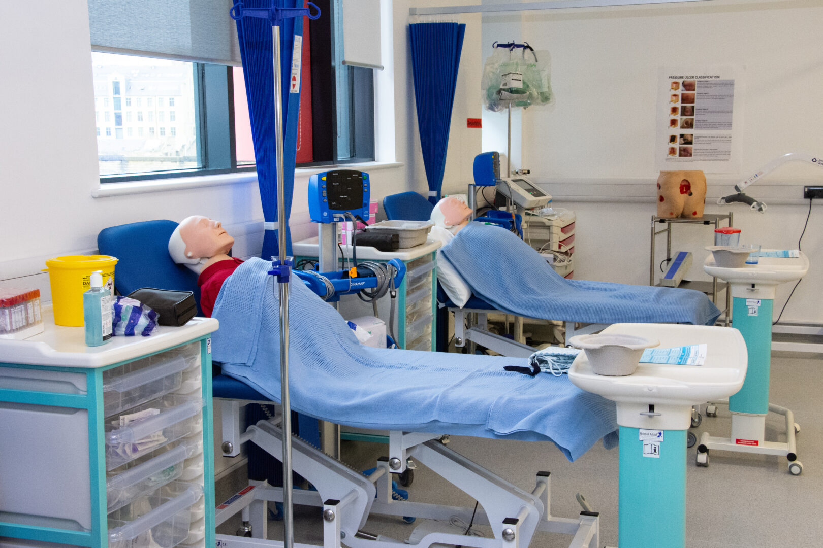 an image of the nursing and healthcare facilities with two artificial patients laying on hospital beds