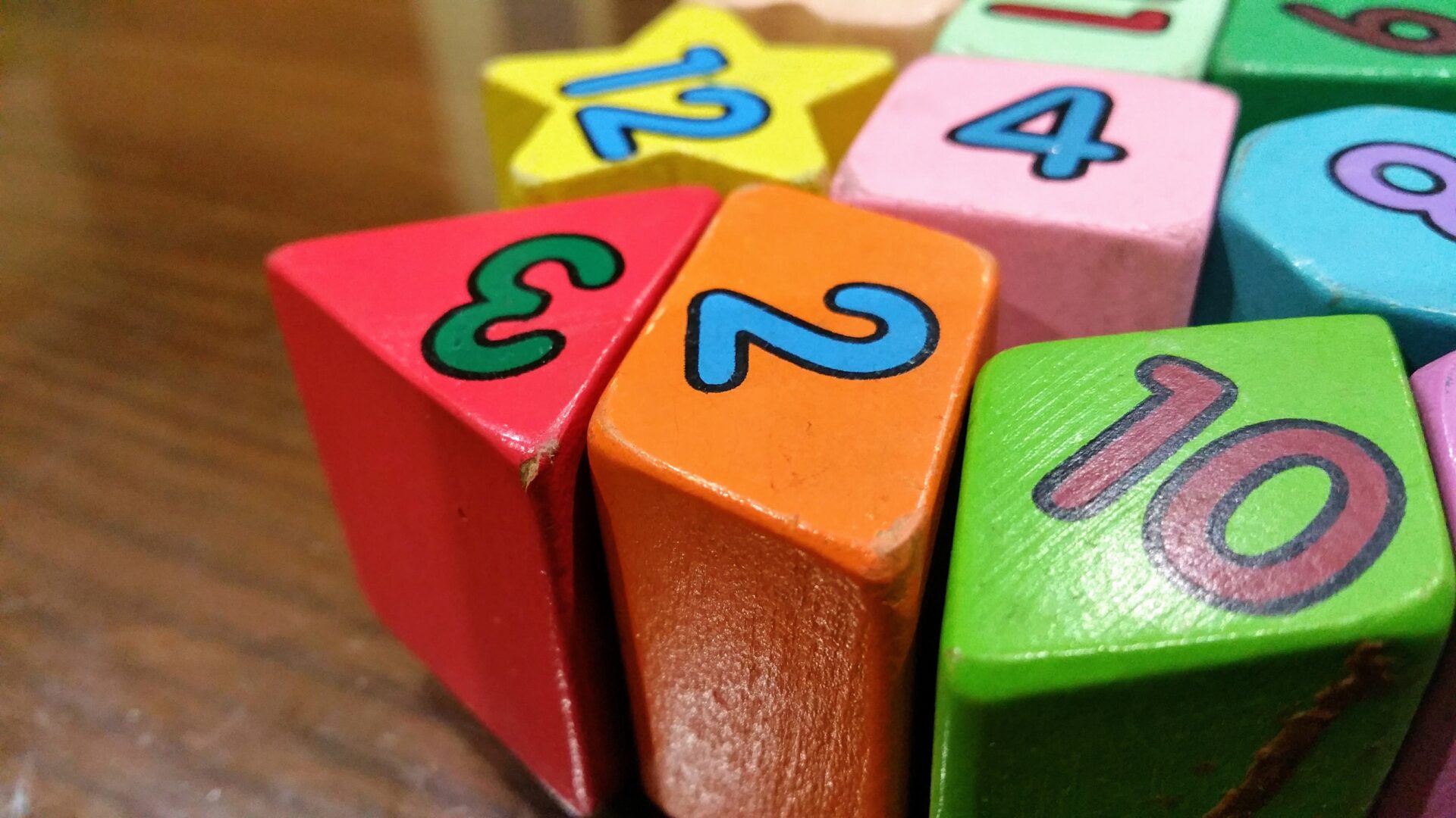 a series of colourful numbered and shaped blocks