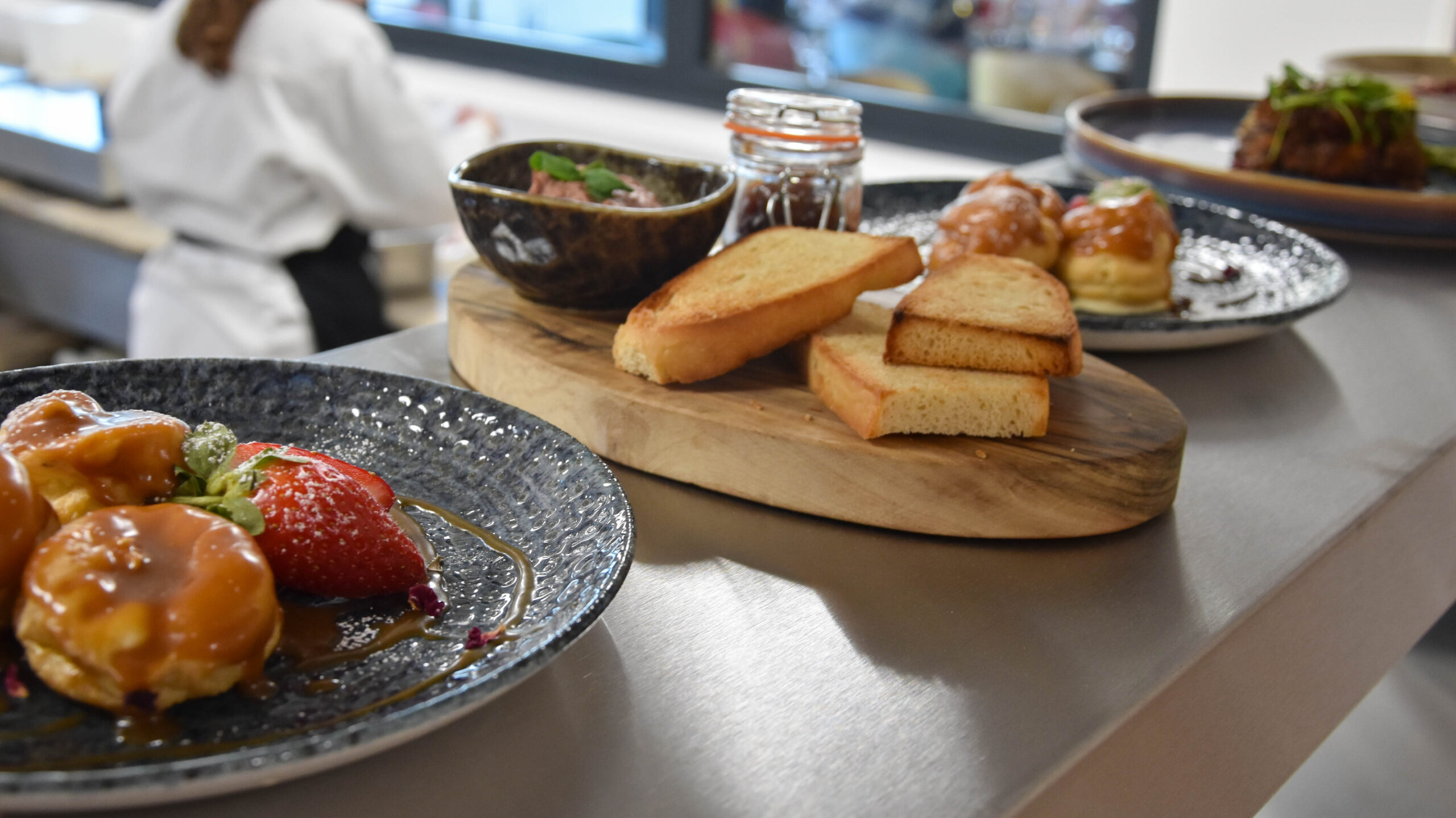 Plates of food ready to go out